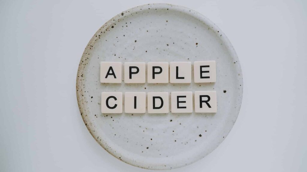 apple cider spelled with tile letters